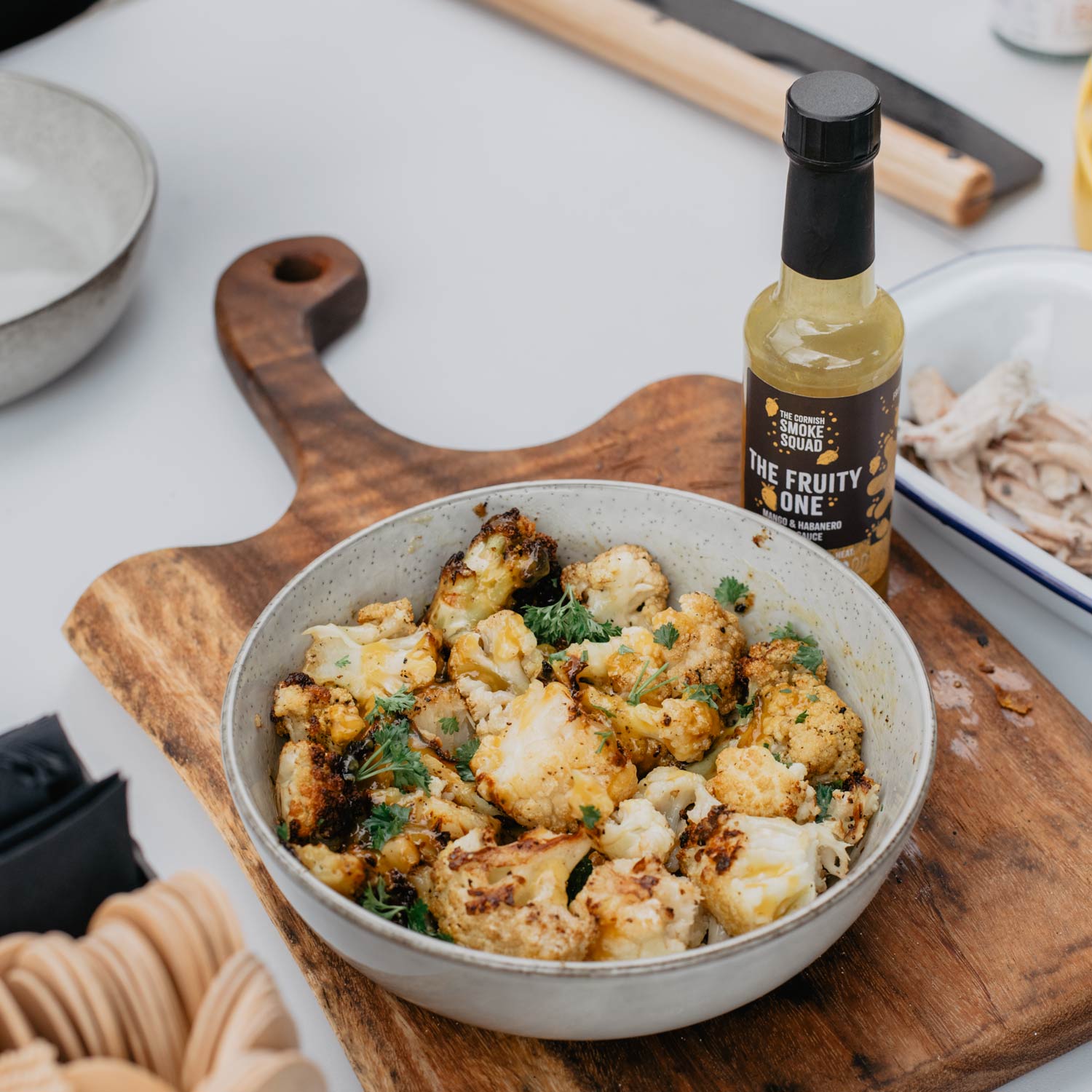 BBQ'd cauliflower coated in a mango and habanero hot sauce