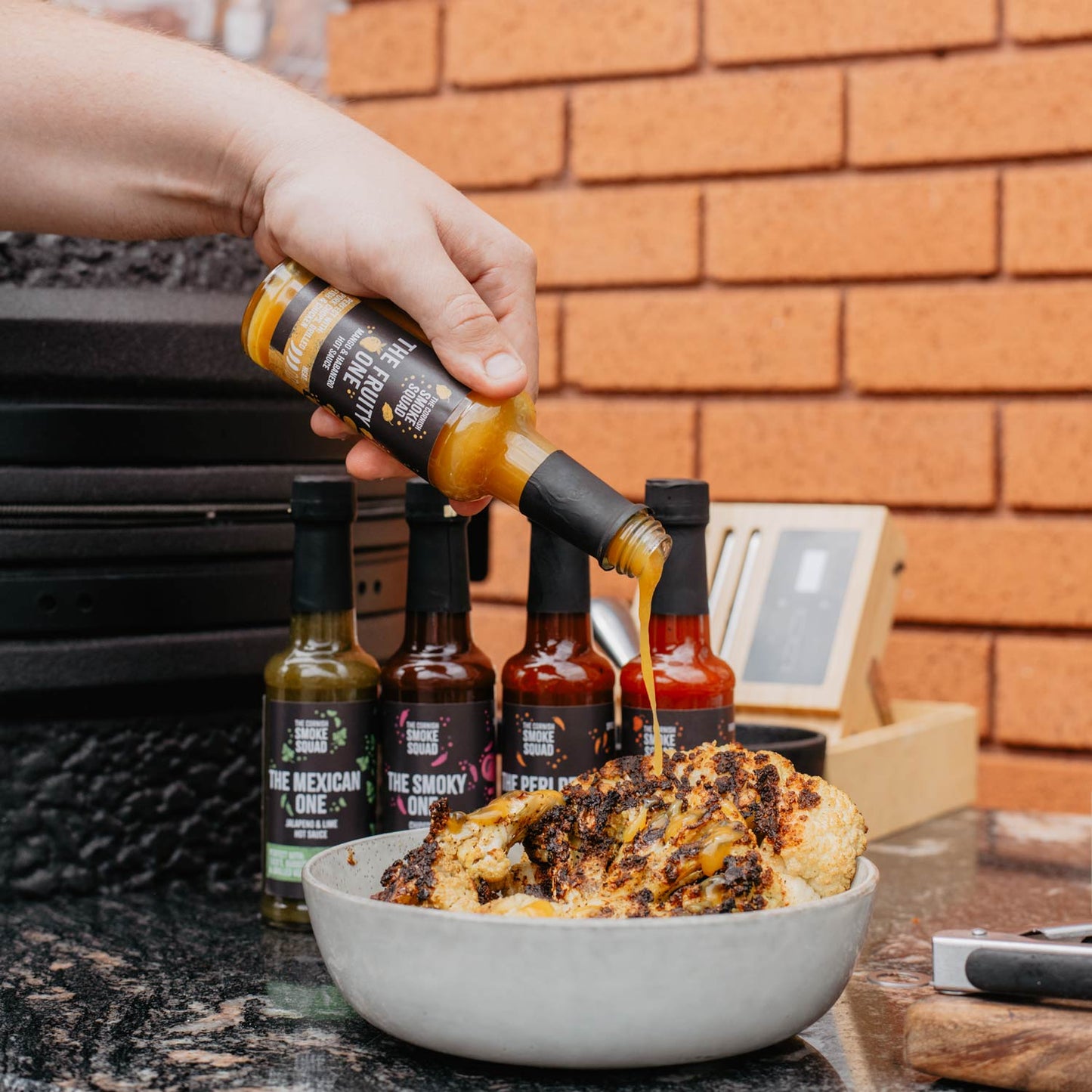 mango and habanero hot sauce drizzled over bbq cauliflower