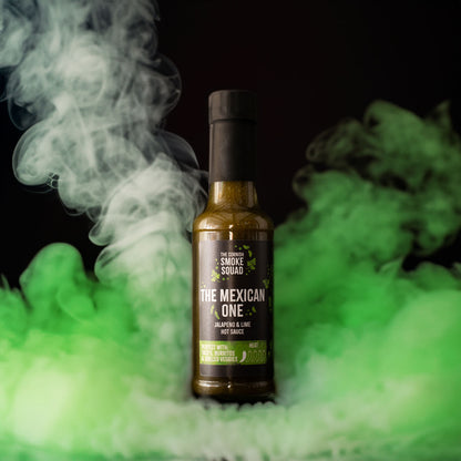 Jalapeño & Lime hot sauce surrounded by green smoke
