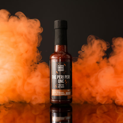 Peri Peri hot sauce surrounded by orange smoke