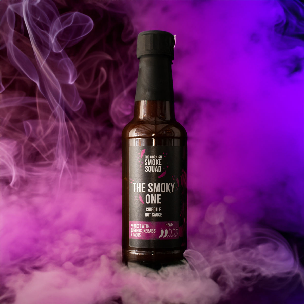 Chipotle hot sauce surrounded by purple smoke